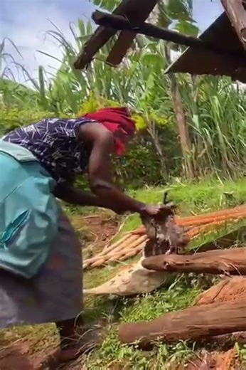 African Mum Cleaning Chicken before cooking in the Countryside #countryside #farm #food #farmlife