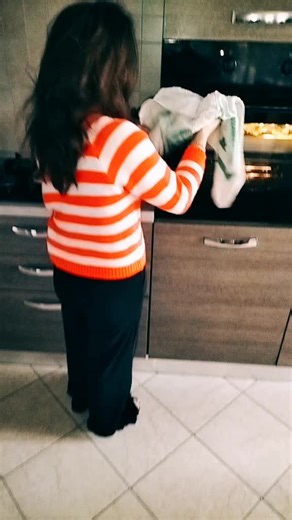 Gift Unwrapping in a Modern Kitchen