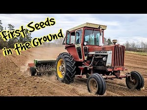 Planting Oats, Alfalfa, and Orchard Grass Using a Farmall 806, John Deere Grain Drill, and Brillion