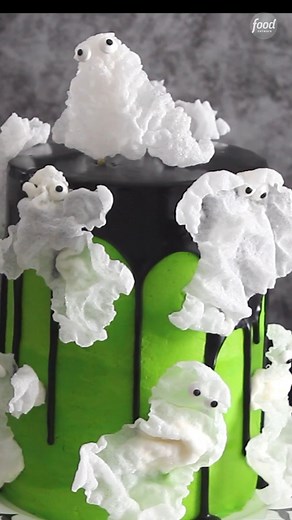 Magical rice paper ghosts make this cake simply BOOtiful!! 👻 👻 We 🖤 it so much, SprinkleBakes! Get the recipe: https://foodtv.com/46o7xhN | Food Network