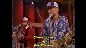 Let's immerse ourselves in the nostalgic doo-wop melodies and the refined vocal harmonies of the legendary band The Beach Boys, with the classic track "Come Go with Me." The original song was written by C.E. Quick. "Come Go with Me" was a hit from 1957 by the group The Dell-Vikings. The Beach Boys recorded and released their cover version in 1978 on their M.I.U. Album. The live performance on The Merv Griffin Show in 1982 was part of the group's touring and performing schedule during that era. A