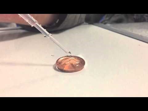 103 drops of water on a penny!