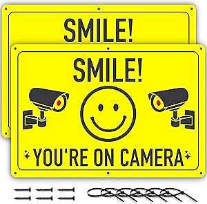 Smile You're On Camera Sign - 11.75 X 8 Inch - 2 Pack - Ideal Aluminum Video Surveillance Security Signs to Prevent Trespassing on Private Property - Perfect for House, Business, Yard or Private Driveway