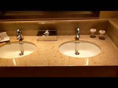 How are the rooms at Iberostar Paraiso Lindo, Maya & Grand Hotel Paraiso different?