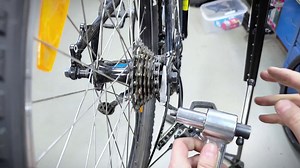 How to fix bike chain skipping. Shimano Altus rear derailleur adjustment.