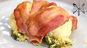 🥓 Bacon Wrapped Cauliflower with Cheese Stuffing 🧀 Here is what you'll need: Ingredients: serves 4 1 tablespoon extra-virgin olive oil 1 lemon, juiced salt & pepper to season 1 head cauliflower, leaves removed and stem trimmed so cauliflower lays flat 1 large bag spinach 2 large eggs, beaten 4 green onions, thinly sliced 2 cloves garlic, minced 3/4 cup shredded cheddar 4 oz / 120g cream cheese, softened and cubed 1/2 cup dried breadcrumbs 1/4 cup grated Parmesan 1 lbs / 500g thinly sliced baco