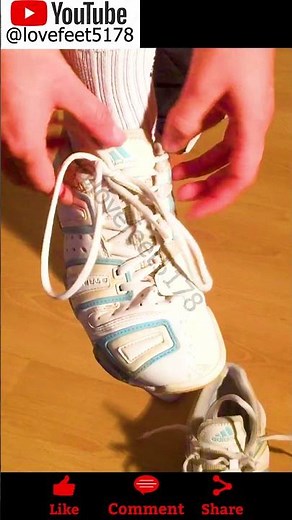 Girl after sport shows her sweaty feet and stinky sneakers, she takes out the dirty sweaty insoles