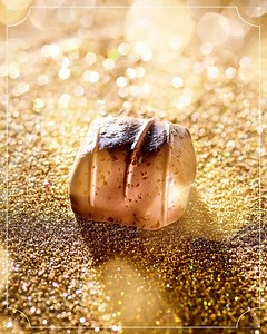 5.1K views · 273 reactions |  Milk Chocolate Almond Caramel  Dark Chocolate Hot Cocoa  White Chocolate Raspberry Our Sparkle Collection chocolates are topped with *actual* edible sparkles so you can taste the magic of holiday spirit with every bite. | GODIVA | Facebook