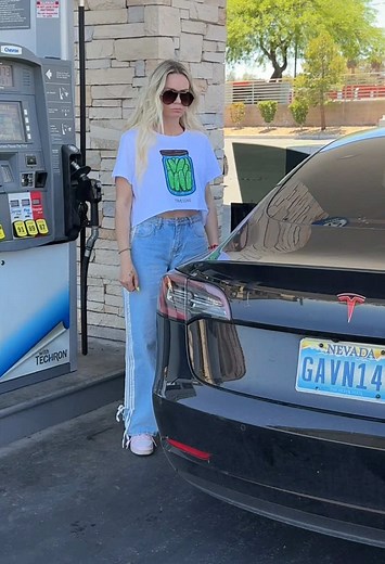 Cute Blond Tries Fueling a Tesla: Hilarious Moment