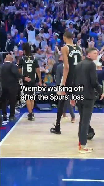 Wemby walking off after Game 4