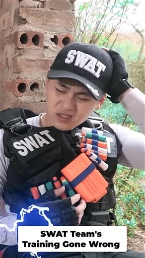 OMG! 😱 SWAT TEAM'S TRAINING just went CRAZY! 💥 Watch what happens when their high-tech gear malfunctions. 😂 This is TOO funny to miss! Who do you think will win this epic NERF battle? 🤔 Tag your friends who would join this squad! 👇 #NerfWars #SWAT #TrainingFail #Comedy #Action #Reels #Trending #Viral #FunnyVideo #ToyGuns | GUGU NERF WAR