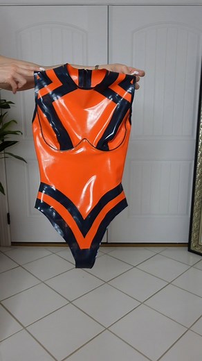 Natalie Nightwolf ❤ on Instagram: "New video! Link in bio! 李 Orange & Black Latex Bodysuit Try On from @elinharness.official #bodysuit #latex #ootd"