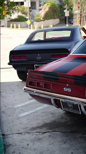 1968 Camaro pro-street LS swapped in Black. 1969 Camaro carbureted cruiser in Orange.