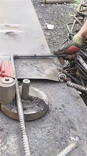 Manual Rebar Bending Process Creating Precise Angles For Reinforced Concrete Construction