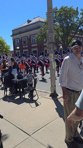 Really fun to have the @marchingillini right outside our front patio for the Labor Day parade in downtown Champaign 🧡💙 | Mad Goat Coffee Champaign