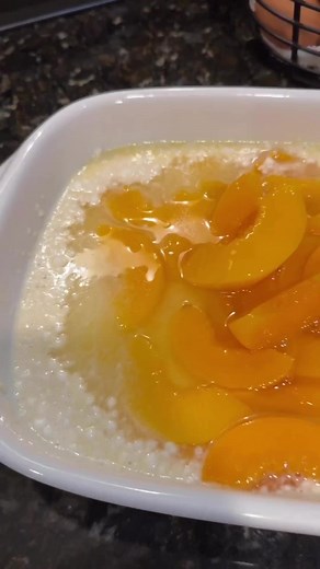 Who loves homemade peach cobbler? 😋 Here is how I was taught to make it: 1 large can of sliced peaches in heavy syrup 1 stick of butter 1 cup of sugar 1 cup of milk. 1 cup of flour - melt butter in the microwave in a baking dish - add the sugar, milk and flour together and whisk- pour undrained can of peaches in the middle, do not stir and bake at 400 or until golden brown on the top. #peachcobbler #sweettreats#dessert #southerncharm#southernliving#mawmawtaughtme | Kandi's Kreations