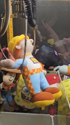 Winning an almost 20 year old Bob the Builder plush from the claw machine. #clawmachine #arcade