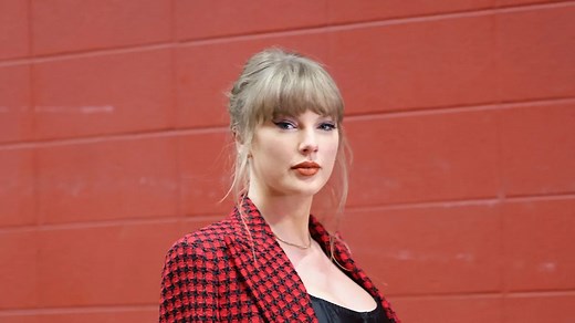 Taylor Swift Wears Tight Red T-Shirt and Black Leather Miniskirt in New Album Interview