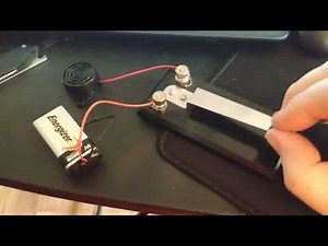 Inexpensive Morse code practice key.