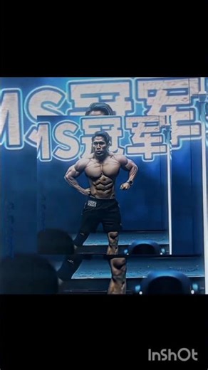 Bodybuilder showing muscles on stage 💪