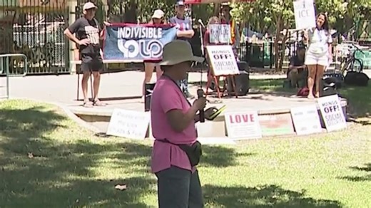 Concerned citizens banded together in protest today, at Central Park in Davis