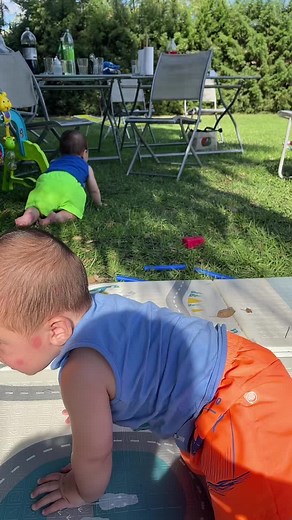 Toddler Exploring Play Mat in Outdoor Garden