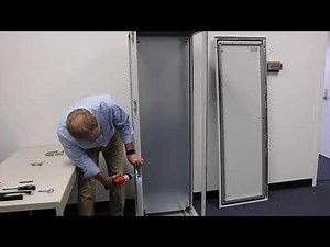 Removing the door and reversing the hinges on a TS 8 enclosure installation