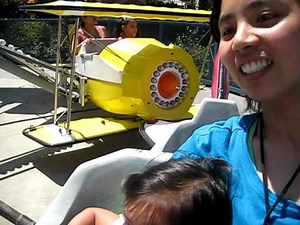 Hannah in Adventure City riding Barnstormer Planes