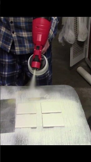 Coat bulk tiles with Titanium Dioxide in seconds with a cordless paint sprayer