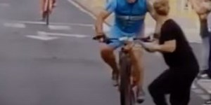 Cyclist smashes into woman on phone as he races towards finish line
