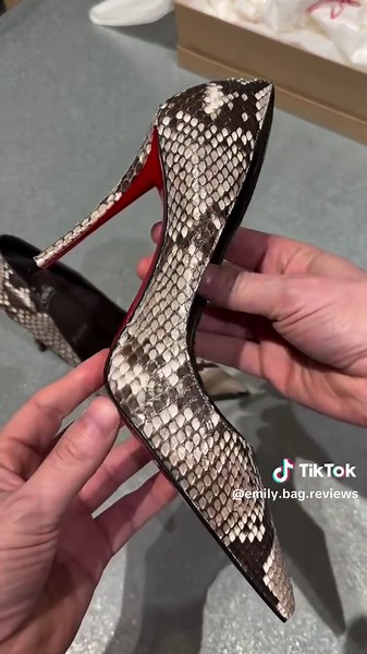 Christian Louboutin Roccia Python Miss Z 100mm pumps. Crafted from exotic python leather, these pumps feature the iconic red sole and a sleek, pointed toe design, offering a bold and sophisticated look. #ChristianLouboutin #PythonPumps #LuxuryFootwear #RedSole #HighFashionShoes