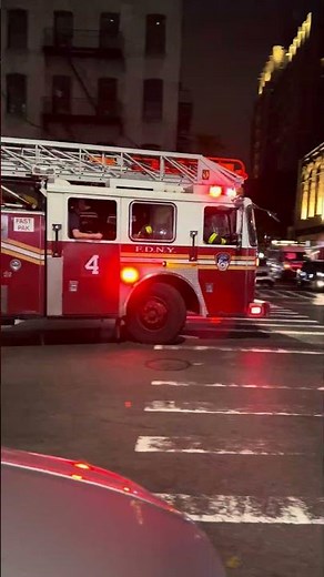 FDNY Ladder 4, Pride of Midtown, responding from quarters.