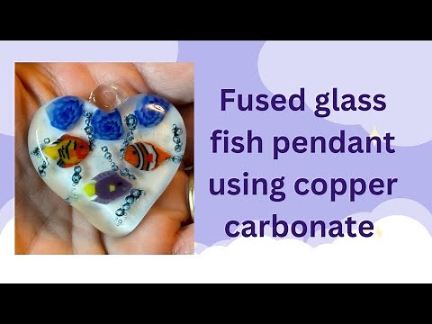Fused glass fish pendant using copper carbonate.