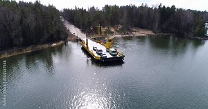 Skåldö cable ferry, Cinema 4k flight towards a yellow cable ferry, in Skaldo, in the tammisaari archipelago, in Finland