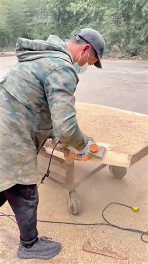 Woodworking Process Using a Handheld Power Planer on a Giant Timber Slab