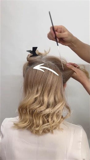 Messy Voluminous French Roll for Short Hair