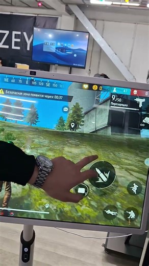 Playing Free Fire on a tablet with a mobile stand