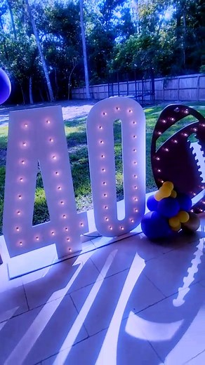 LSU Tailgate Party in a backyard patio. #lsu #lsutailgate #mikethetiger #balloons #lsuparty #lsufootball #birthdayparty #partyplanner #40th #marquee #purpleandgold #collegefootball