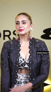 Huma Qureshi Redefines Elegance in Mumbai. Bollywood beauty Huma Arrived at the event wearing a stylish Indo-western outfit: a white and black printed skirt and a matching blouse, layered with a heavily embroidered black jacket. Her look is completed with bold pink lipstick and statement traditional earrings. #humaqureshi #huma #bollywood #bollywoodqueen | Ashika Gill