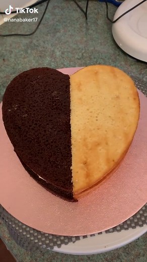 Half and half heart cake, half vanilla with jam and cream, half chocolate with chocolate buttercream #halfandhalfcake #heartcake #vanillacake #chocolatecake #cake #spongecake #baking #bakingnana #baker #❤️baking #victoriasponge #cakes #cakesoftiktok