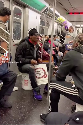 Talented Kid Singing and Drumming on NYC Subway