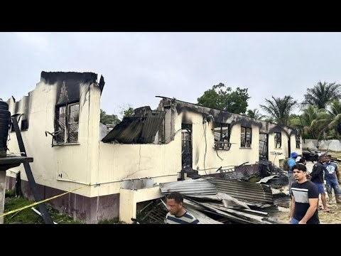 Police in Guyana think fire that killed 19 girls was started deliberately