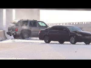 Vehicles slide on icy Interstate 10 in Houston, Texas - February 15, 2021
