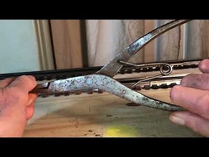 Lionel Postwar Truck removal from a Truck Pivot Clip on a 336155 Log Dump Car.