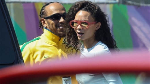 Lewis Hamilton all smiles as F1 star shares hug with stunning model Ashley Moore