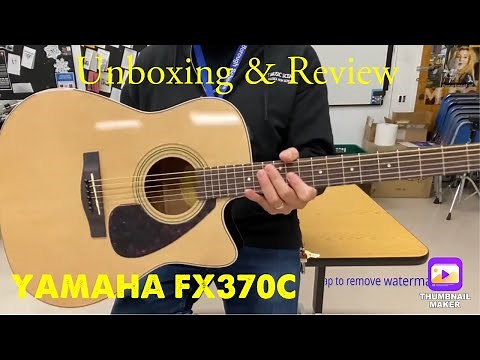 Checking out the YAMAHA FX370C A/E Guitar