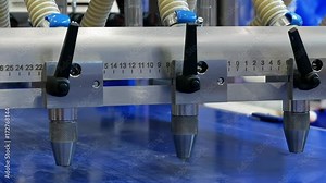 Food factory automated robotic machine. Conveyor product line for cooking and packing rations and food packs. Robotics and automatic lines used instead of human labor on factories and plants.