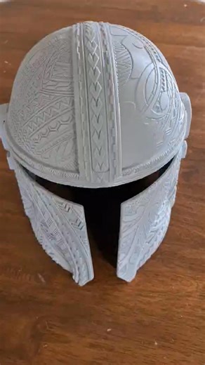 Tribal Mandalorian Helmet First Look — Insane 3D Print Detail! Take a look at this 3D printed Tribal Mandalorian helmet — the detail on this raw print is absolutely next level. Every line, groove, and carved pattern pops even without paint, making this one of the craziest Mando designs I’ve printed yet. If you're into Star Wars, Mandalorian armor, sci-fi props, or custom 3D printed helmets, this reel is for you. This is just the shell for now, but once it's padded and painted, it’s going to look