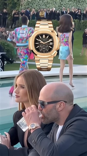 High VIP Life on Instagram: "Jason Statham attended a Versace show wearing a discontinued Patek Philippe Nautilus 5980 Chronograph in 18k rose gold. This timepiece presents a black gradient dial with rose gold applied hour markers and luminescent coating. Retail price: $ 97,500.00 Market price: $ 200,000.00 Follow @highviplife to see what VIP life is! #jasonstatham #patekphillipe #luxurywatch #luxury #luxurylifestyle #rosiehuntingtonwhiteley #fashionshow #wealth"
