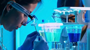 A dedicated woman scientist works meticulously with a sophisticated microscope girl in a hightech lab, surrounded by advanced tools, showcasing remarkable progress in science and technology